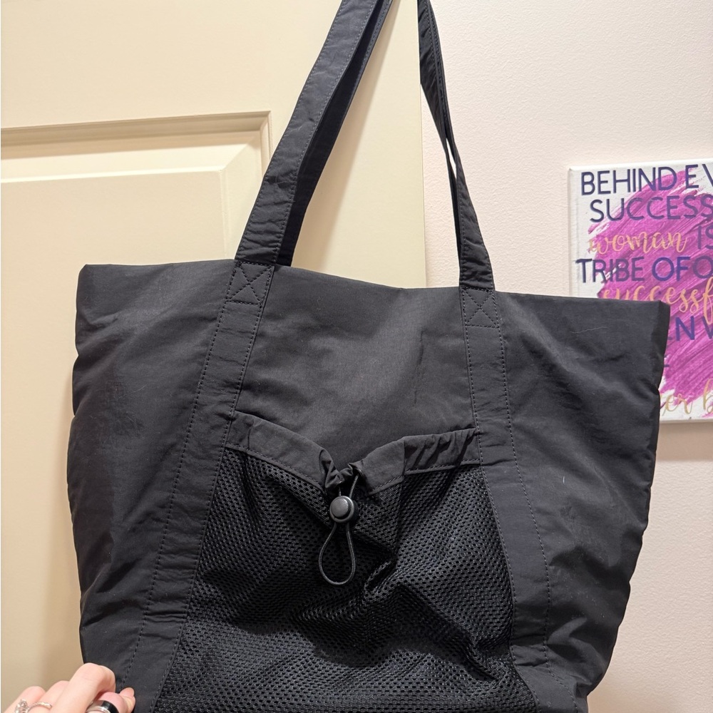 Elegant Black Tote with Mesh Pocket